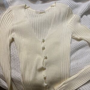 Urban Outfitters - Bonnie Pearl Button Up Sweater in Cream